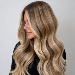 A soft shadowed root melting into brighter ends, with the wave left in