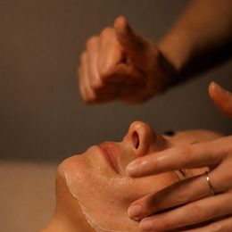A clay masque at the end of a deep-cleansing facial