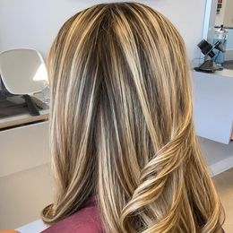 High-contrast full highlights, curled and finished