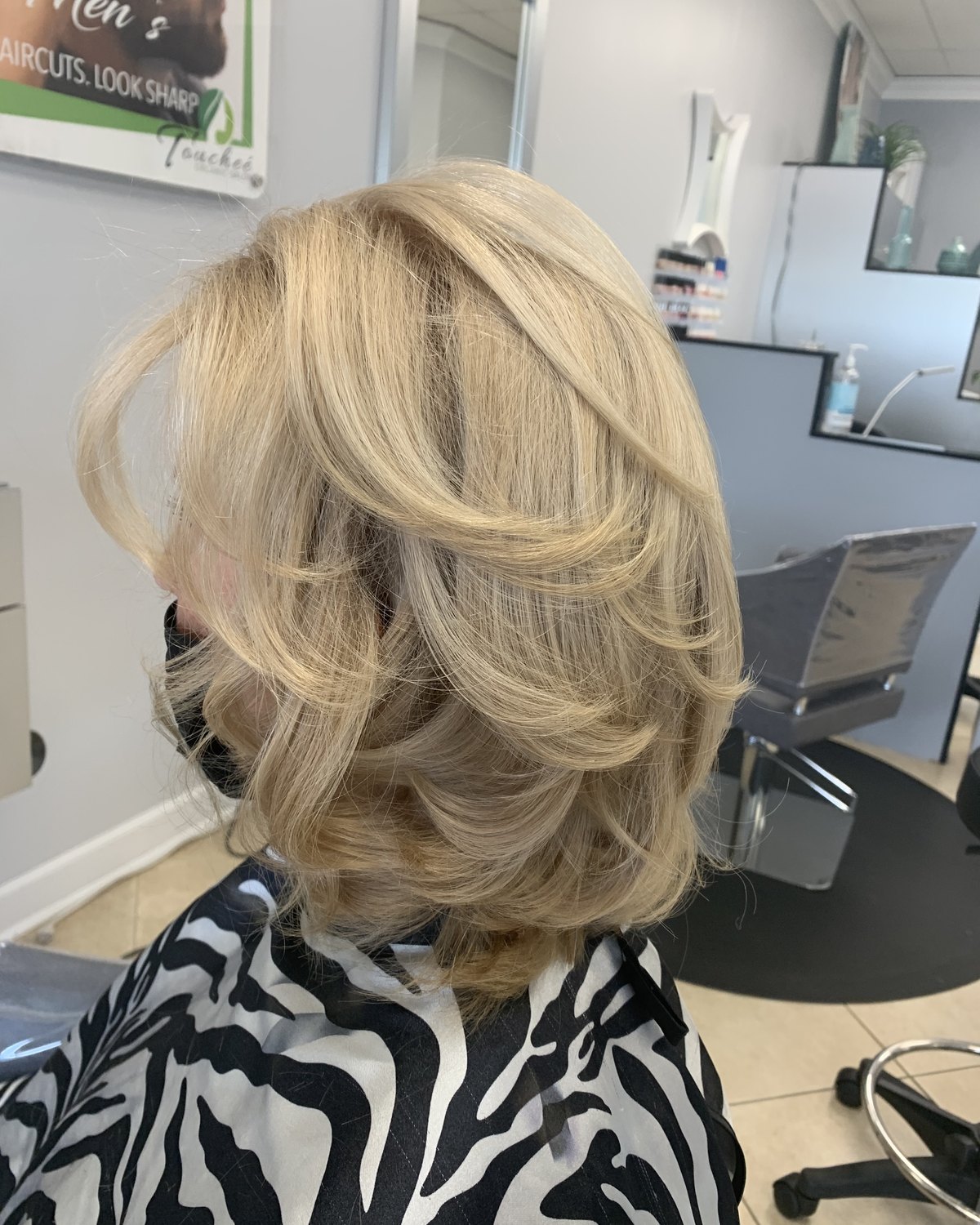 Layered blonde bob with movement through the ends