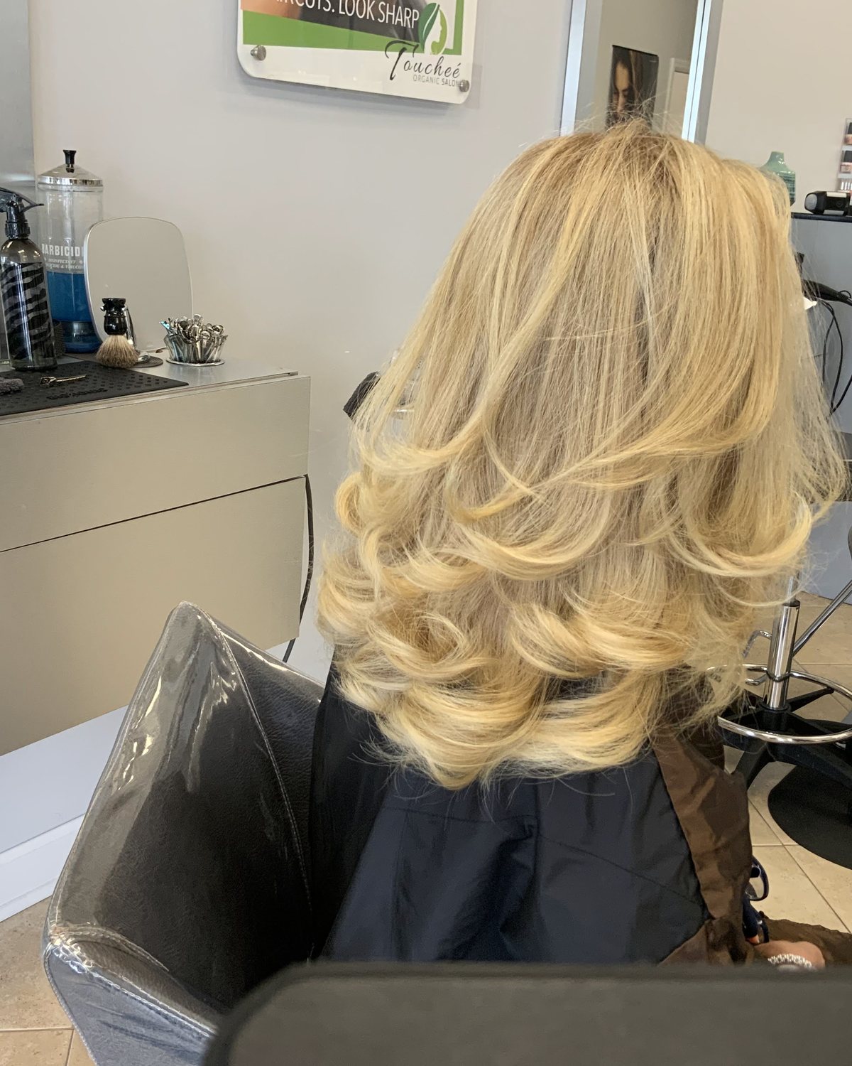 Blonde set into soft curl at the chair &mdash; Touche&eacute; Organic Salon, Juno Beach
