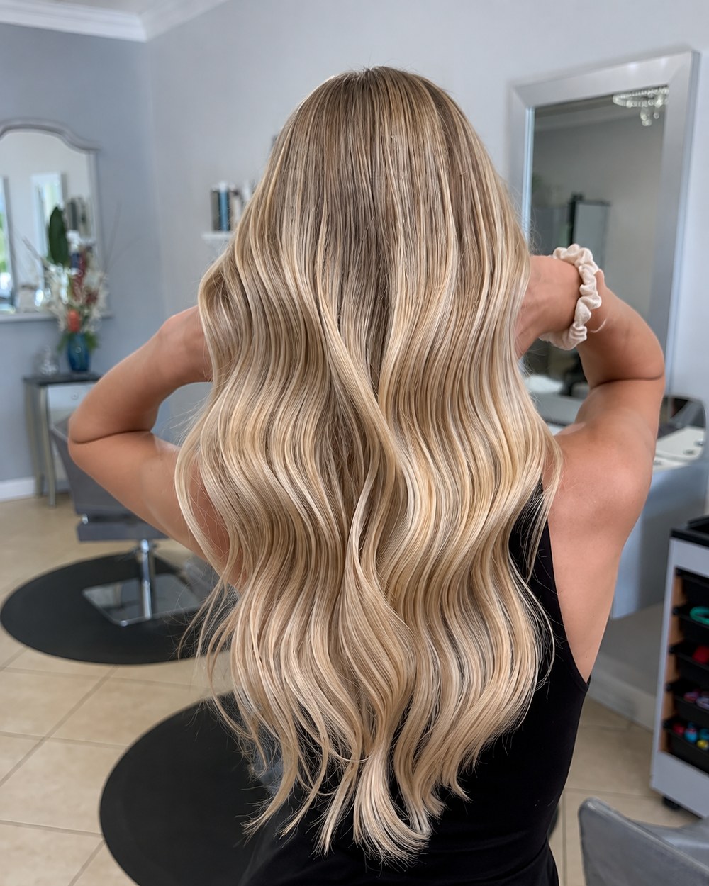 Long blonde waved and finished at the chair — Touchée Organic Salon, Juno Beach
