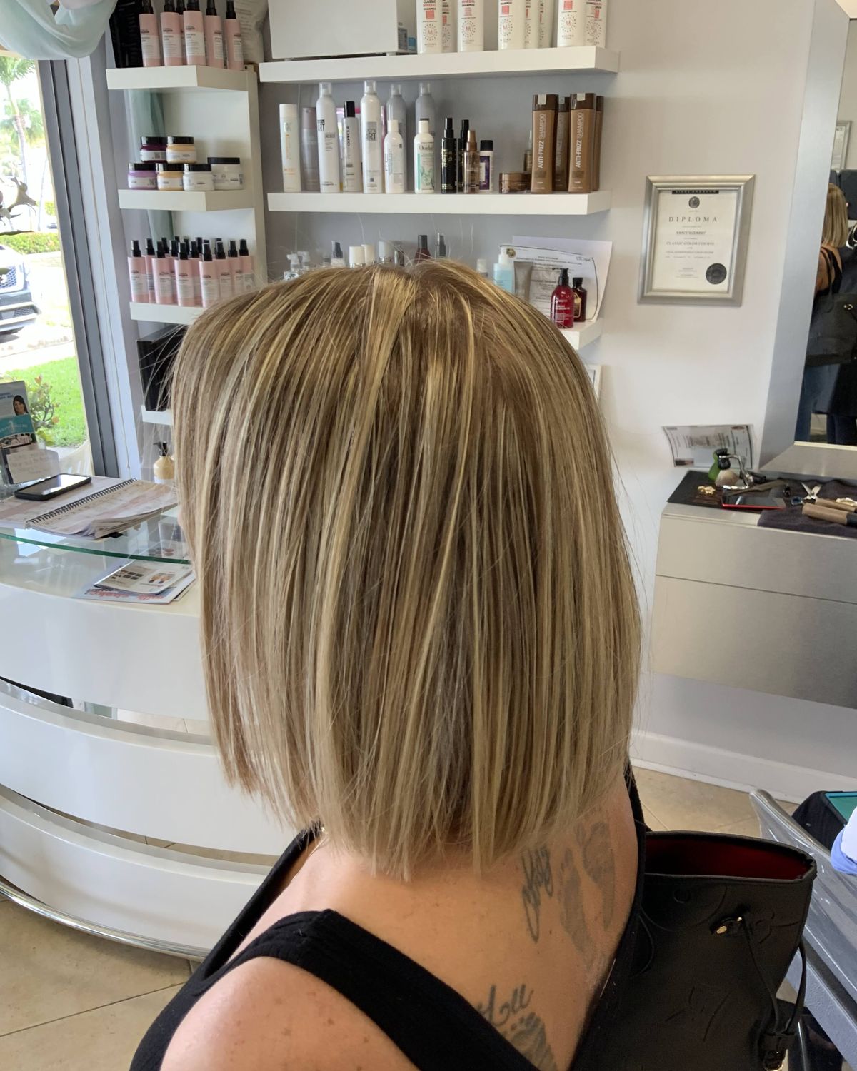 Shoulder-length bronde with fine highlights — Toucheé Organic Salon, Juno Beach
