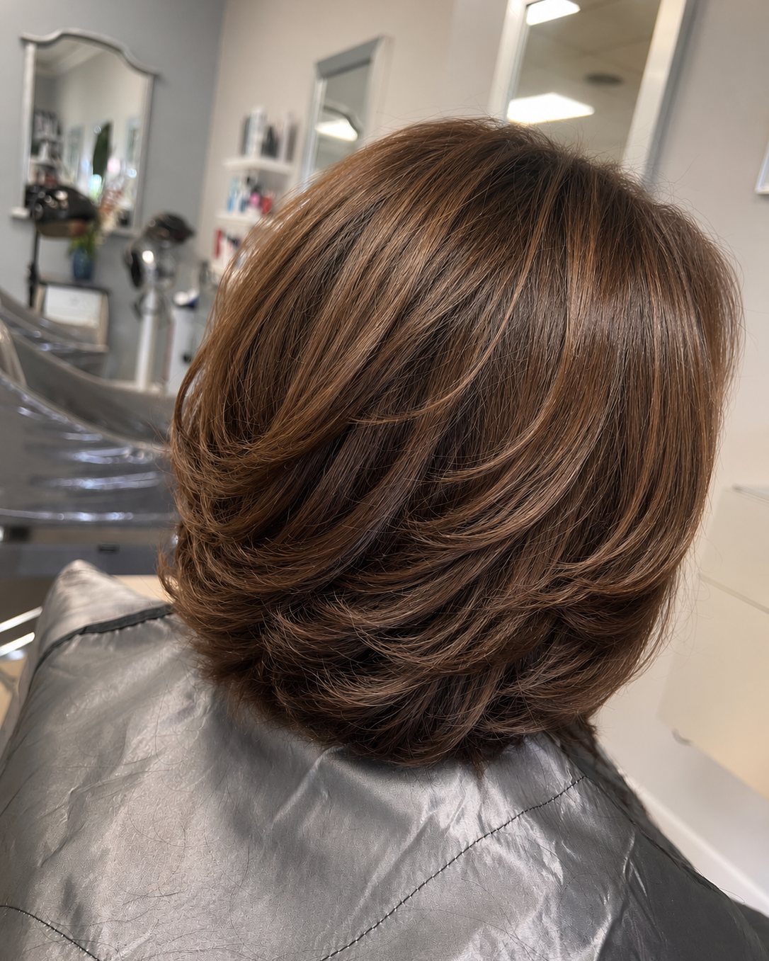 Brunette bob with movement layered through the interior, Touchée Organic Salon