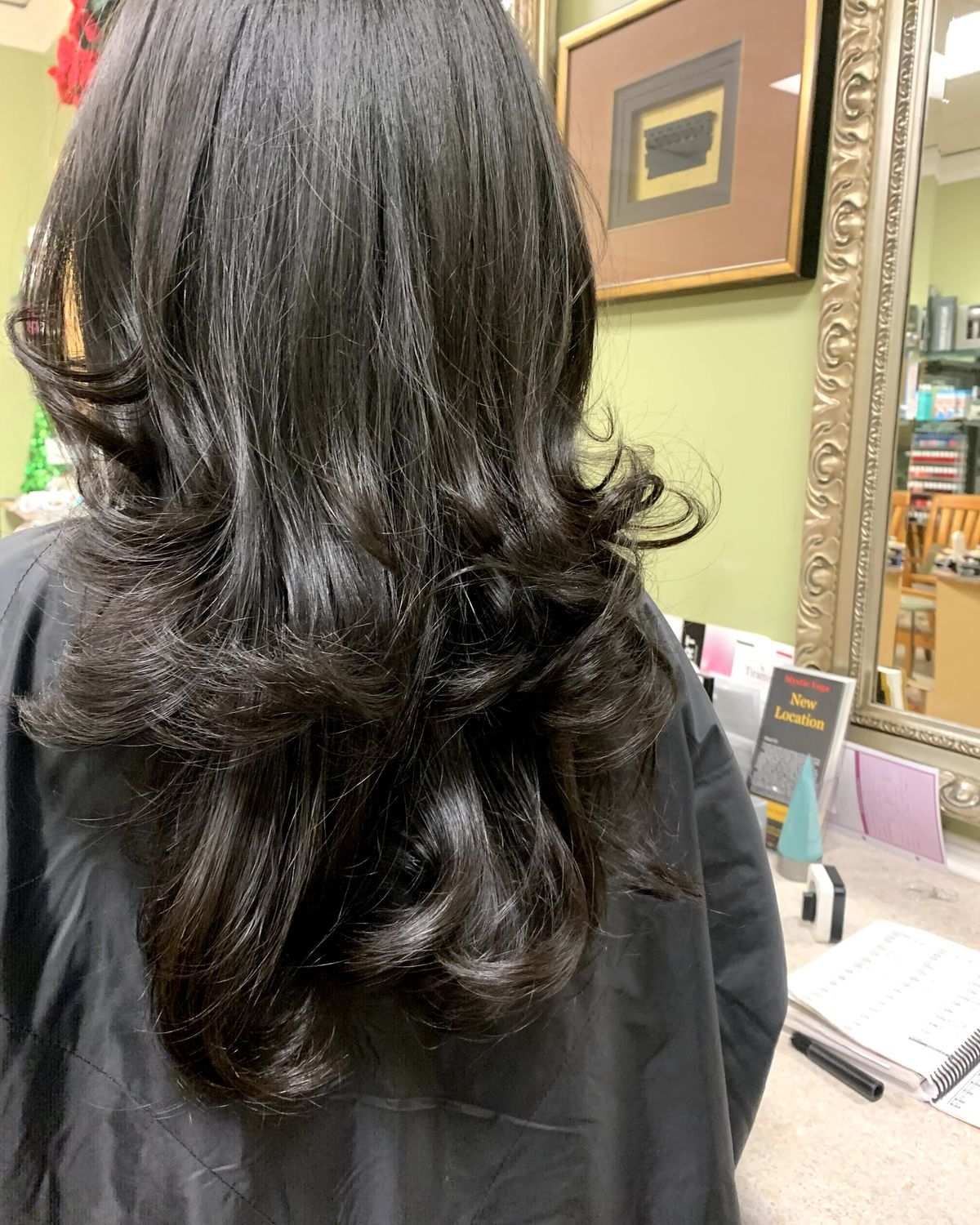 Dark brunette with soft movement — Touchée Organic Salon, Juno Beach