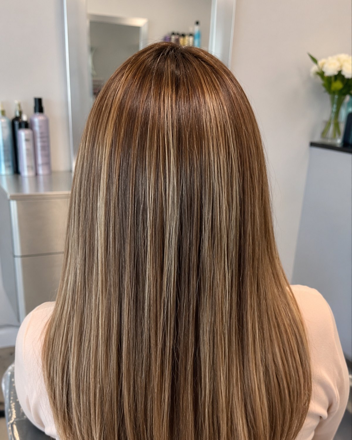 Dimensional brunette with fine blonde highlights, glossed — Touch&eacute;e Organic Salon, Juno Beach