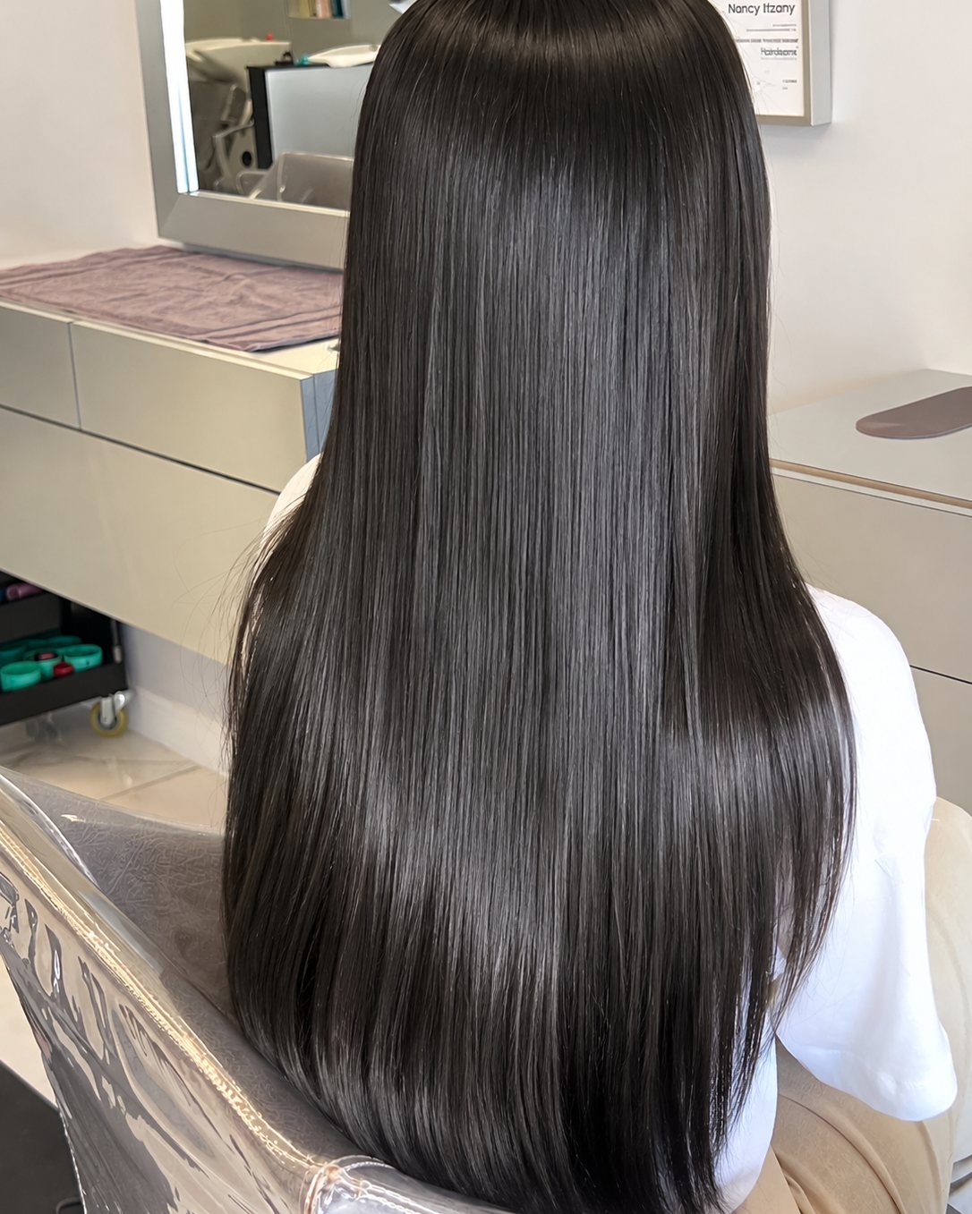 Gray covered in one solid dark tone, root to end — Toucheé Organic Salon, Juno Beach