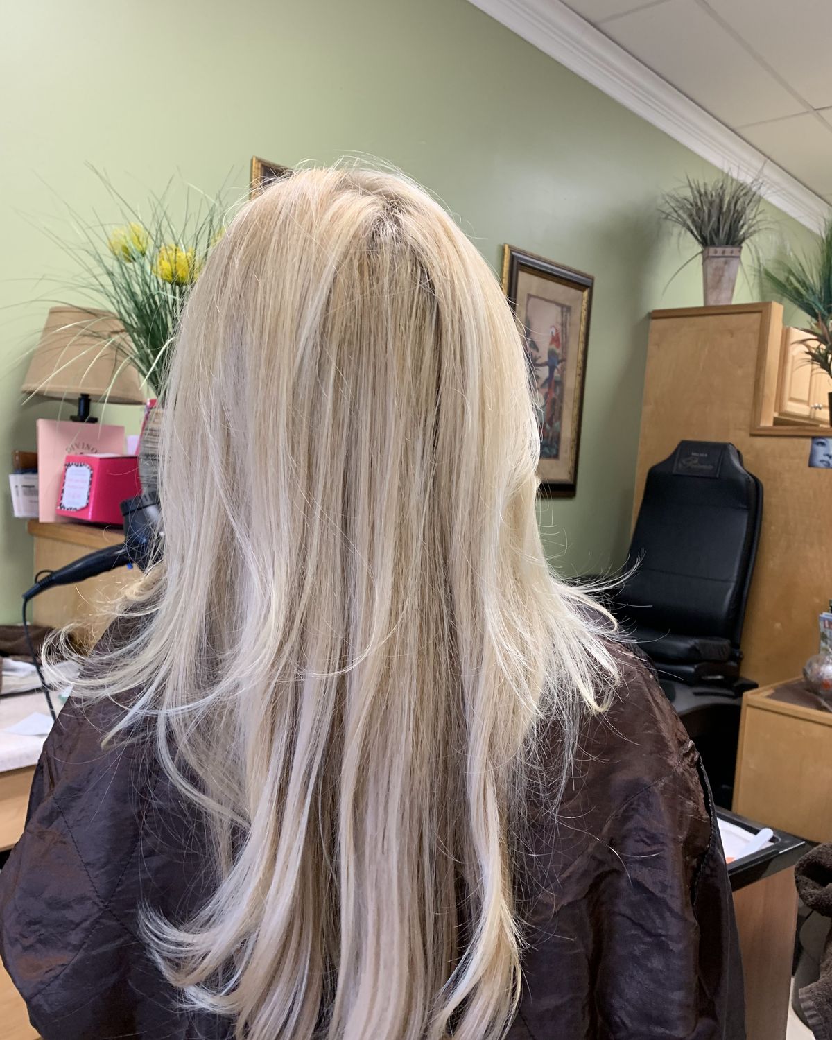 Long platinum blonde with a shadowed root — Toucheé Organic Salon, Juno Beach