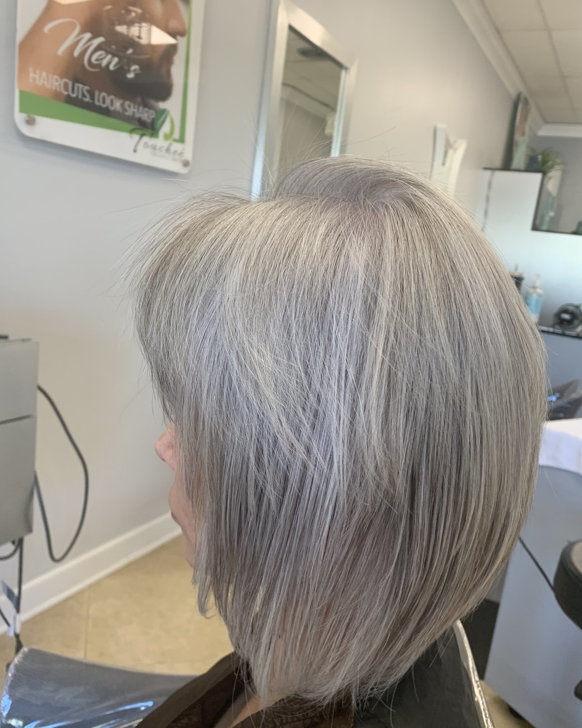 Silver bob worn to the jaw, cut and toned at Touchée Organic Salon, Juno Beach