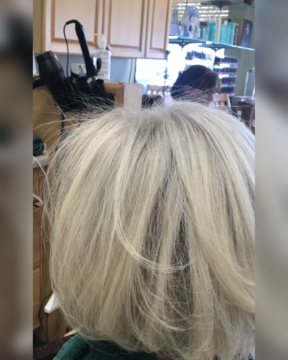 Platinum blonde worn short and sharp — Toucheé Organic Salon, Juno Beach