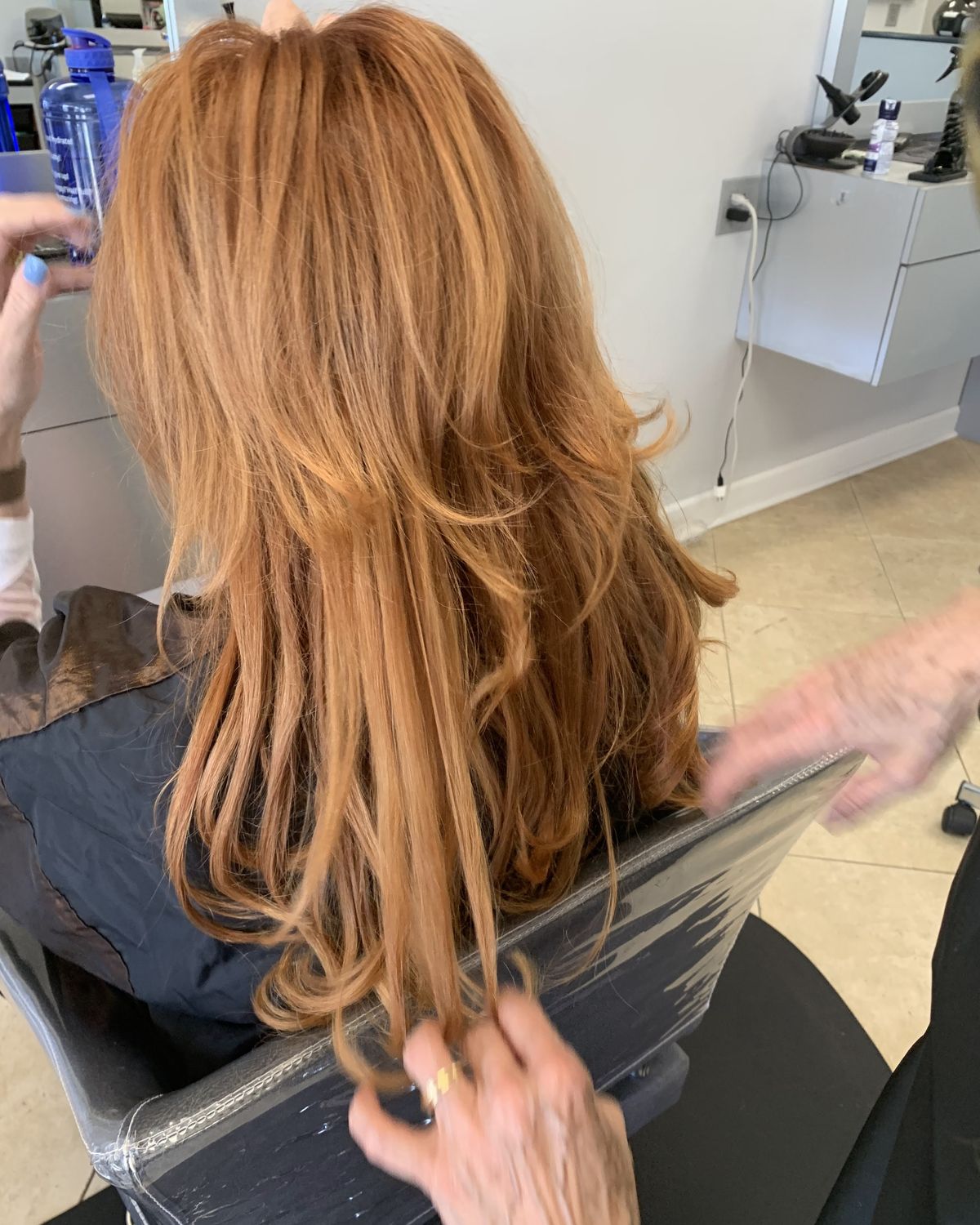 Strawberry copper being worked through at the chair — Touchée Organic Salon, Juno Beach
